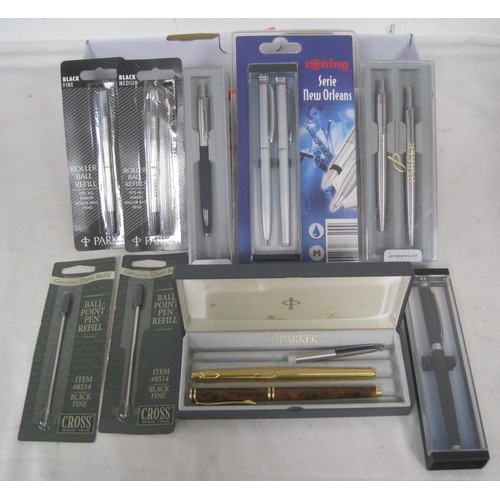 124 - Pens and refills. A Parker slimline gold-plated fountain pen matched with a box; a Parker jotter and... 