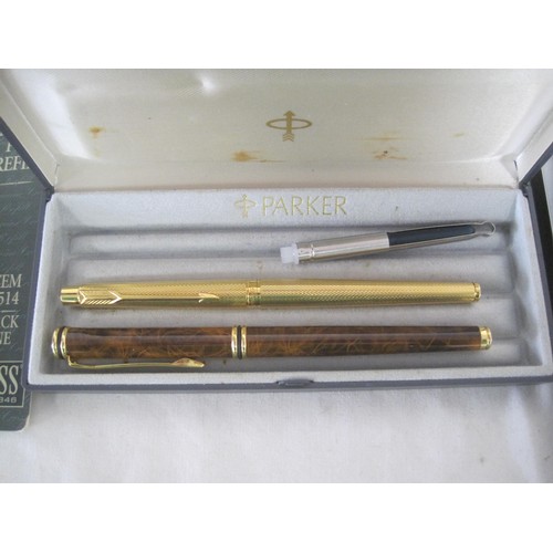 124 - Pens and refills. A Parker slimline gold-plated fountain pen matched with a box; a Parker jotter and... 