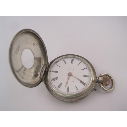 152 - A lady's 935 foreign silver half hunter enamelled fob watch. The silver case (diameter 33mm) with fo... 