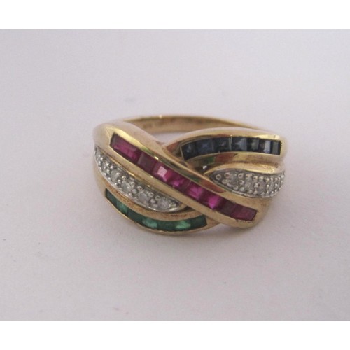 154 - A pretty 9 carat gold dress ring set with crossover lines of small diamonds, rubies, emeralds and sa... 