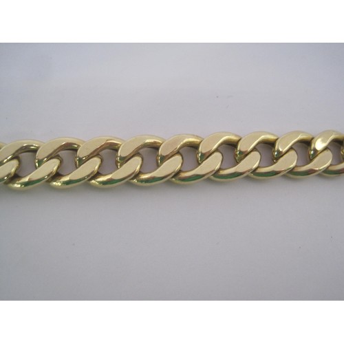 165 - A 9 carat imported gold bracelet of hollow curb links, length approx. 20cm, weight approx. 10.7g, st... 