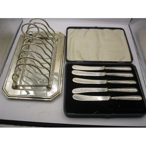 181 - 5 silver handled knives in case and an EPNS toast rack and tray