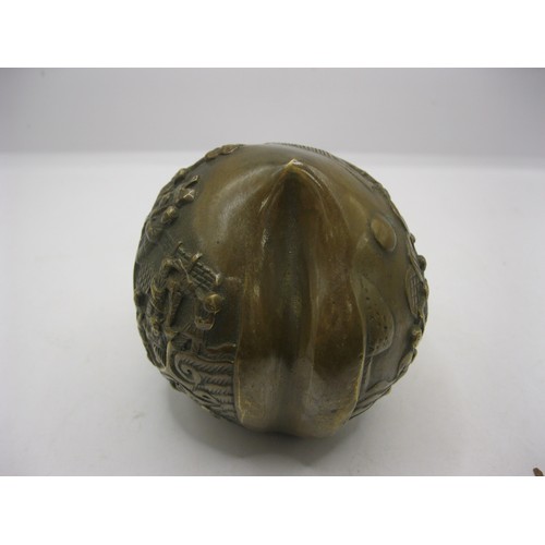 189 - An Oriental bronze decorative nut