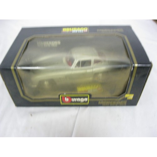 204 - A boxed Burago 1:18 scale Mercedes Benz 300SL die cast vehicle