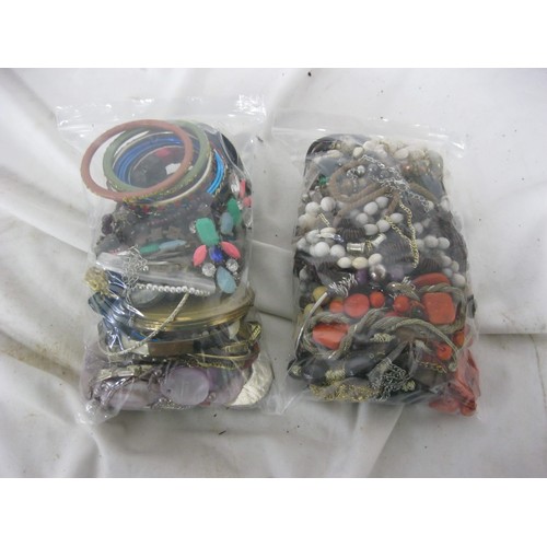 217 - 2 bags of mixed costume jewellery