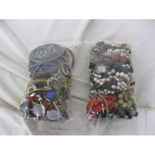 217 - 2 bags of mixed costume jewellery