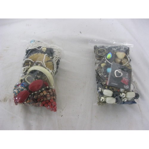 216 - 2 bags of mixed costume jewellery