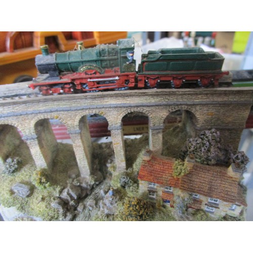 24 - A wooden model of a roughly two and a quarter gauge locomotive, a static Flying Scotsman and a Danbu... 