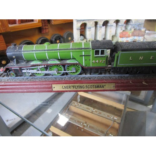 24 - A wooden model of a roughly two and a quarter gauge locomotive, a static Flying Scotsman and a Danbu... 