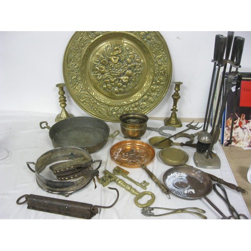 230 - A large tub of brasswork and other items including a copper frying pan, brass charger decorated with... 