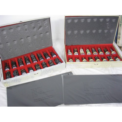 163 - A Lord of the Rings chess set, cased and in mint condition: 2 cases, one for black, one for white, t... 