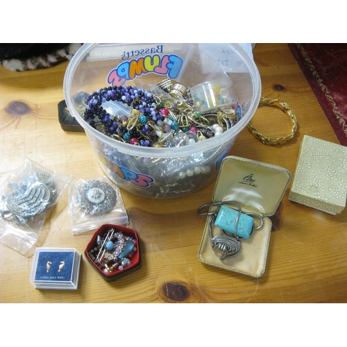 10 - A tub of interesting costume jewellery, contains some silver but not fully checked