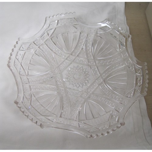 96 - A moulded glass gondola bowl, a footed glass fruit bowl (diameter 26cm), a decoratively moulded plat... 