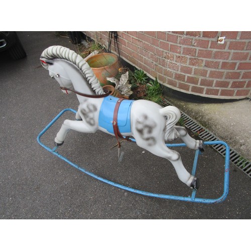 29 - 1960 plastic on metal frame rocking horse suitable for a older infant or junior as is of a larger pr... 