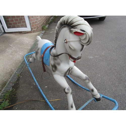 29 - 1960 plastic on metal frame rocking horse suitable for a older infant or junior as is of a larger pr... 