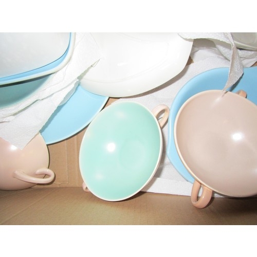 39 - A box of Poole Pottery Twintone to include Sky blue ,Ice green,,Salmon pink and other colourways as ... 