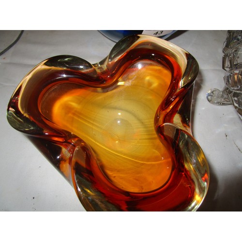 43 - Six pieces of Murano style glass along with a three footed glass bowl by Bleikristall Crystal.
All p... 