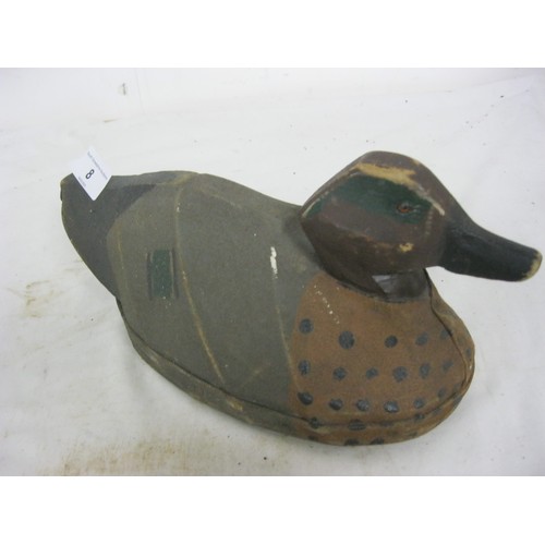 8 - A vintage wood and canvas painted duck decoy in good order