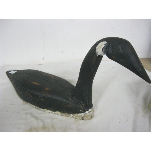 9 - A hand cut and painted wooden Canada Goose decoy