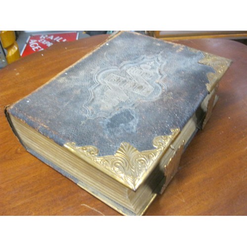 2 - A late Victorian leather-bound family bible with brass clasps