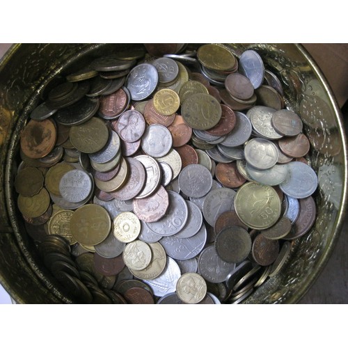 36 - A tin of mixed foreign coinage