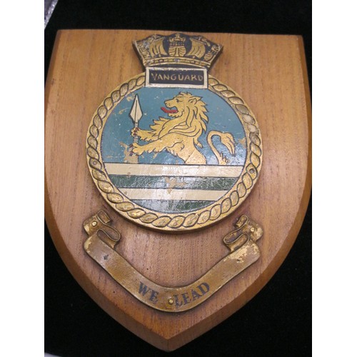 62 - A vintage ship's crest for HMS Vanguard, a plastic sleeve containing a driving stud from an 1870s 9l... 