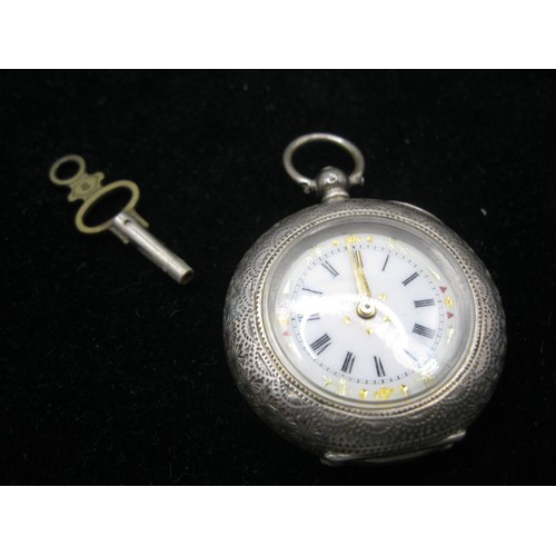 66 - A .935 continental silver ladies pocket watch with ornately engraved case with floral decor and enam... 