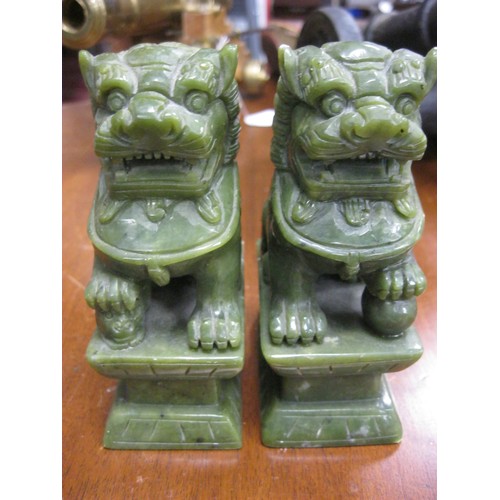 49 - A pair of likely soapstone Dogs of Foe, slight a/f to one ear tip but an eye-catching pair