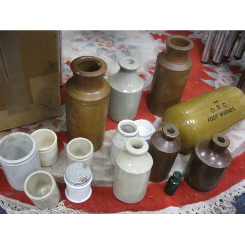 54 - AN assortment of vintage earthenware pots and flasks