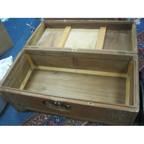 52 - A vintage Oriental camphorwood chest, nicely carved