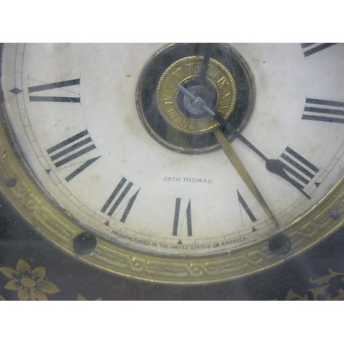 77 - An Ansonia 8 day clock, believed railway, in Gothic style, in running order