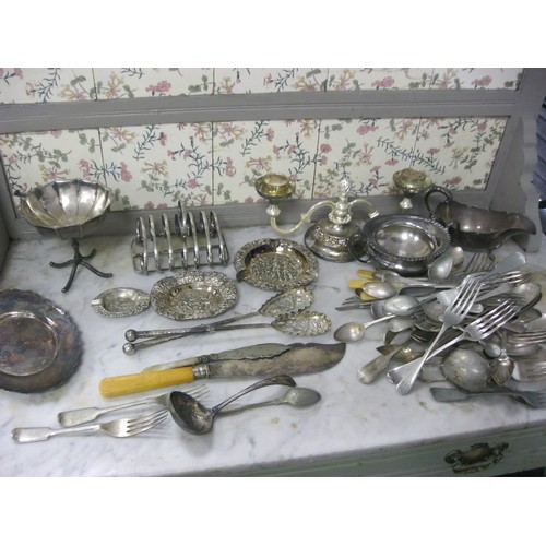 86 - An assortment of antique silver plate including a quantity of cutlery