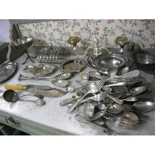 86 - An assortment of antique silver plate including a quantity of cutlery