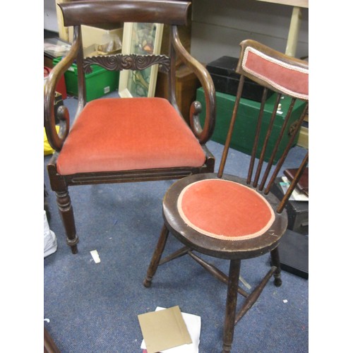 92 - A pair of chairs with red upholstery, one with round seat and spindle back, the other a more substan... 