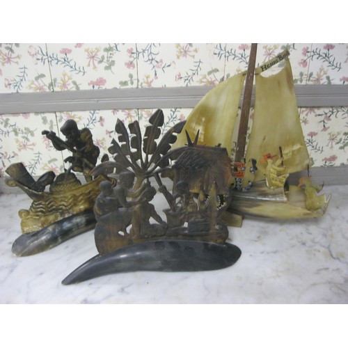 93 - A vintage sailing ship made of horn and a pair of Oriental carved scenes in horn, mounted on wooden ... 