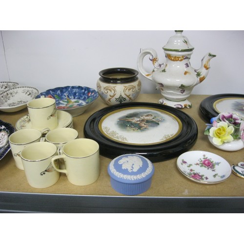 105 - An assortment of interesting china and porcelain including ceramic decanter labels, Spode, Wedgwood ... 