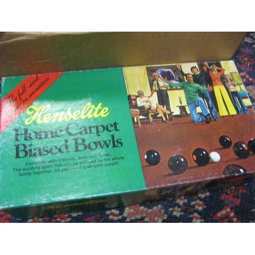 100 - Boxed vintage carpet bowls set, plus two boxed full-size vintage bowling woods.