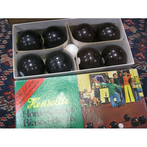 100 - Boxed vintage carpet bowls set, plus two boxed full-size vintage bowling woods.