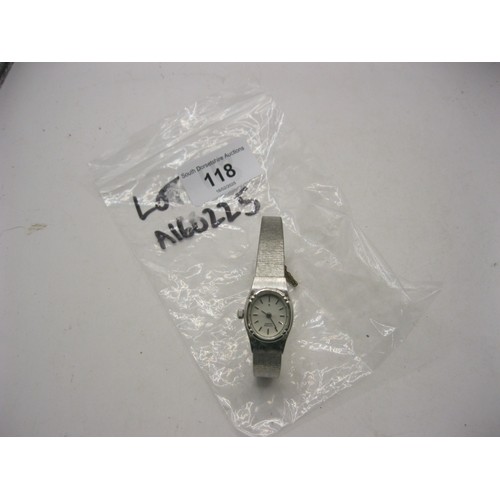 118 - A Citizen ladies quartz wristwatch with metal bracelet and safety chain. A/f requires new battery at... 