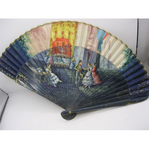 124 - Two decorative vintage fans. (1) hand-painted with Spanish scene and signed, wooden guards and stick... 