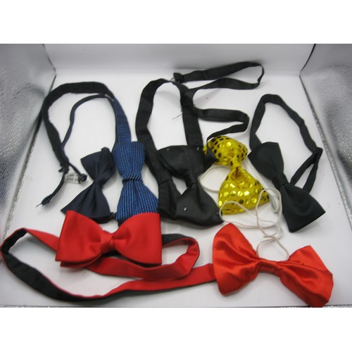 163 - A small box containing bow ties including a light-up example