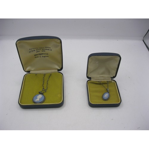 170 - A pair of Wedgwood jasperware cameo pendants in silver mounts, on silver chains, cased