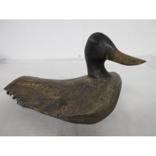 19 - An antique decoy duck, hand-carved and made from a block of root-wood, in good order