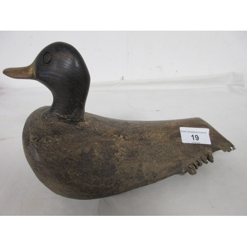 19 - An antique decoy duck, hand-carved and made from a block of root-wood, in good order