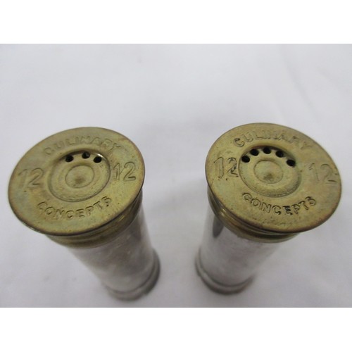 21 - A pair of salt and pepper shakers made from 12-bore Shotgun cartridges, in good order