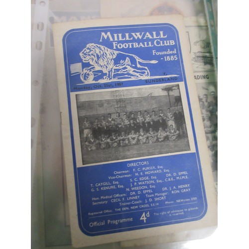 9 - An assortment of vintage football programmes including 1966 World Cup Official Souvenir Programme, 1... 