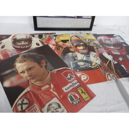 10 - A Michael Schumaker signed Ferrari picture, framed and glazed and in good order, and a number of lar... 