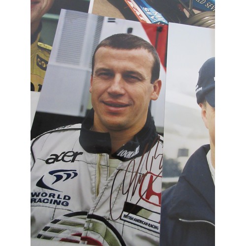 12 - A sheaf of signed photographs of Formula 1 drivers