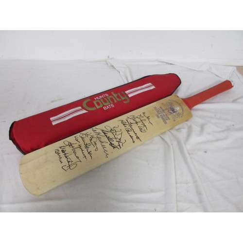 14 - A Hunts County cricket bat signed by the 1999 Gloucestershire Cricket Club double winning team