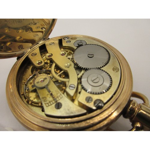 1 - An open faced pocket watch with Swiss mechanism, Moon case, 10 carat gold plated, in full working or... 